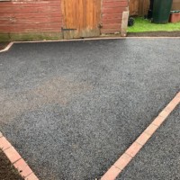 Armstrong's Roads & Driveways are leading tar paving contractors in Ayrshire; this driveway in Kilmarnock KA3 was completed in July 2021 Tarmac driveway Kilmarnock KA3
