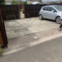 Wallyford EH21 small uneven flag stone driveway, before Armstrong's Roads & Driveways replaced with tarmac. Old flagstone driveway in Wallyford EH21